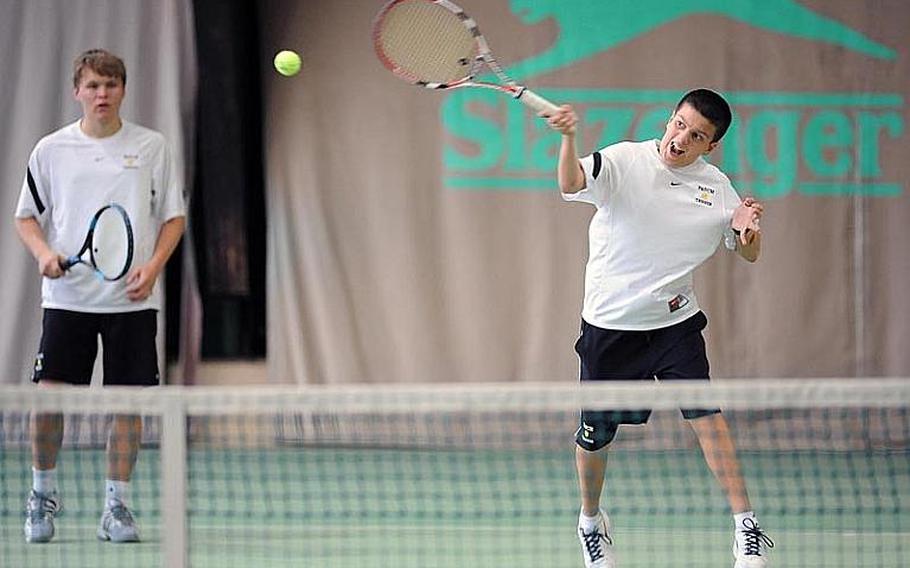 Patch's Alex Srodowski slams a ball across the net for a point against Heidelberg, as teammate Dylan Rehwaldt watches. Fourth-seed Patch fell to  Jack Kolodziejski and Wylder Raney, the top seed, in an exciting semifinal match 7-6 (8-6), 6-7 (6-8, 6-3.