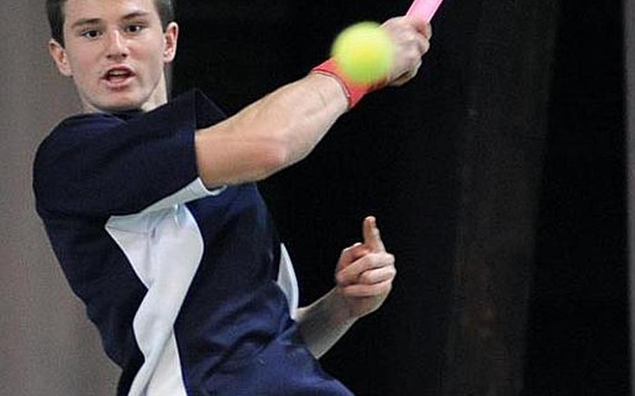 Lakenheath's Peter Kovats returns a shot over the net in his 6-1, 6-0 semifinal loss to SHAPE's Dimitrios Stavropoulos, the tourney's second seed.