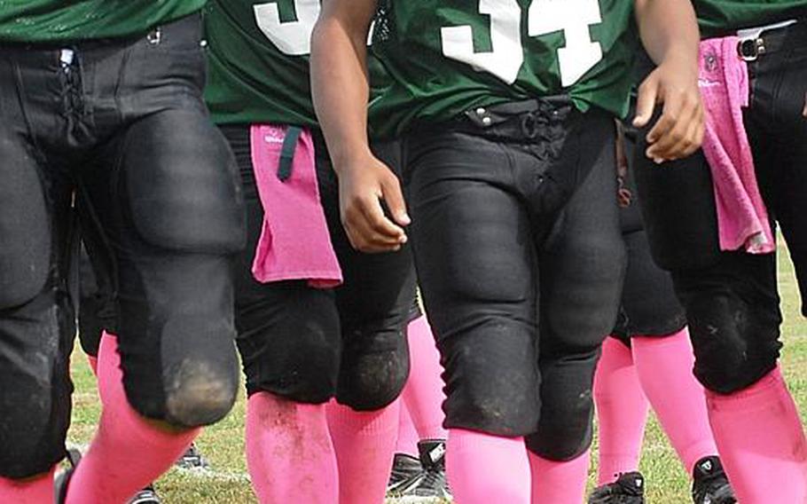 The Naples Wildcats donned hot-pink socks and mouth guards in honor of breast cancer awareness month.