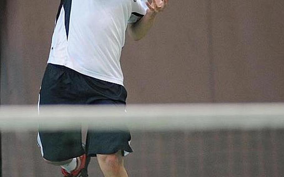 SHAPE's Dimitris Stavropoulos slams a shot across the net in the boys final at the DODDS-Europes tennis championships. Stavropoulos, the second seed, upset top-seeded, two-time defending champion Ajdin Tahirovic of Patch, 3-6, 6-4, 6-4.