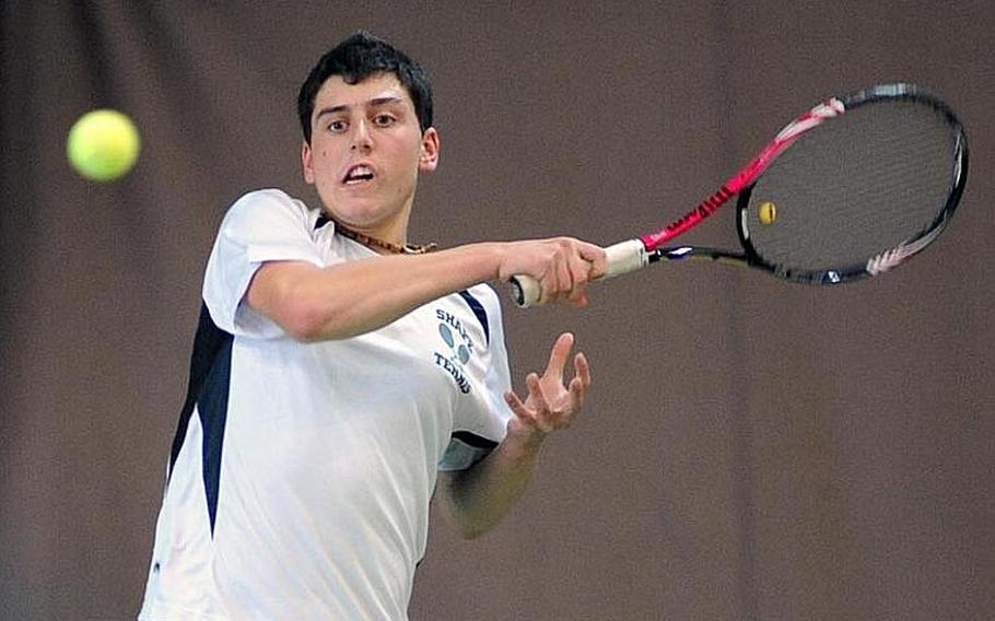 SHAPE's Dimitris Stavropoulos slams a shot across the net in the boys final at the DODDS-Europes tennis championships. Stavropoulos, the second seed, upset top-seeded, two-time defending champion Ajdin Tahirovic of Patch, 3-6, 6-4, 6-4.