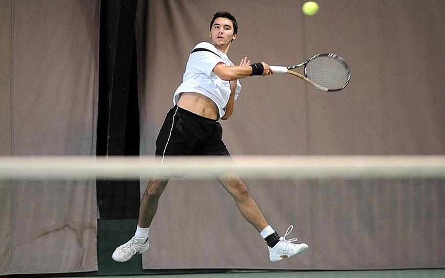 Patch's Ajdin Tahirovic makes a leaping return on a Dimitris Stavropoulos shot in the boys finals of the DODDS-Europe tennis championships. Tahirovic, the top-seeded, two-time defending champion, lost to SHAPE's Stavropoulos, the second seed, 3-6, 6-4, 6-4.
