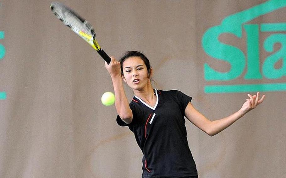 AFNORTH's Alexandria Bellas returns a shot against Patch's Eugenia Srodowski in the girls final at the DODDS-Europe tennis championships. Srodowski captured the title with a 1-6, 6-3, 7-5 win.