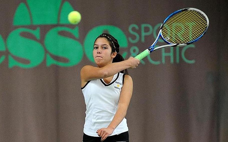 Patch's Marina Fortun returns a shot in the girls doubles final of the DODDS-Europe tennis championships. Fortun and partner Christine Young, the tourney's top seed, beat Ramstein's Sydney Townsend and Jennifer DuBose, the second seed, 7-6 (9-7), 1-6, 6-4.