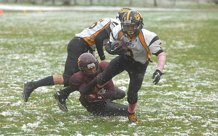 Patch senior running back Curtis Hobson shakes a tackler during Saturday's DODDS-Europe Division I semifinal game at Vilseck. The Panthers won, 30-8, and will play Ramstein for the championship next Saturday.