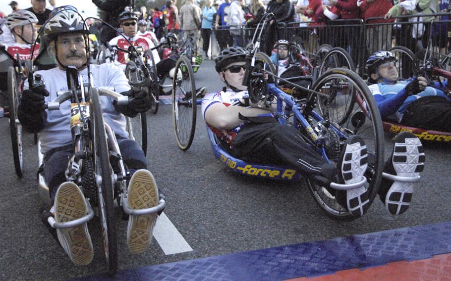 Competitors await the start of the Marine Corps Marathon.