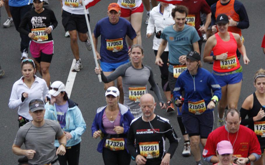 Runners break from the start of the 37th Marine Corps Marathon.