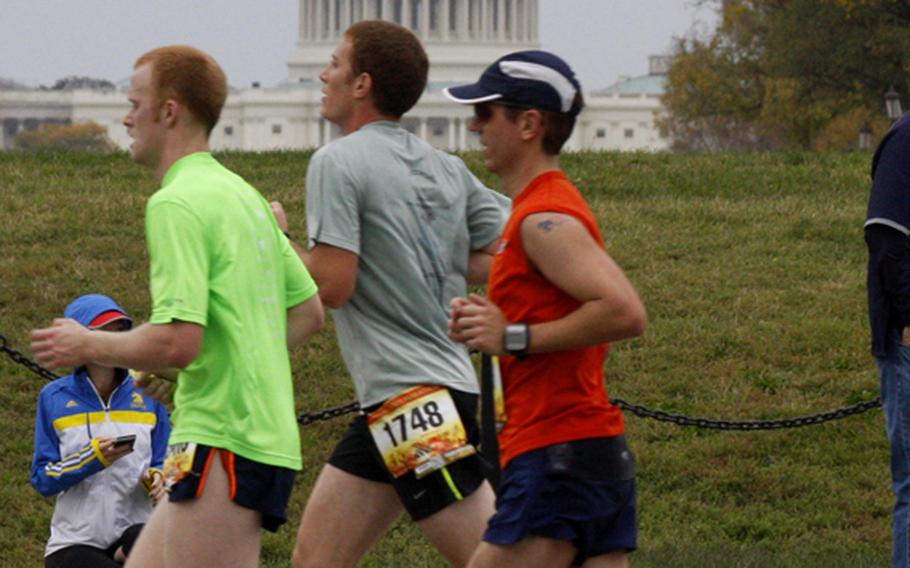 Runners in the 37th Marine Corps Marathon approach the 18-mile mark on the National Mall.