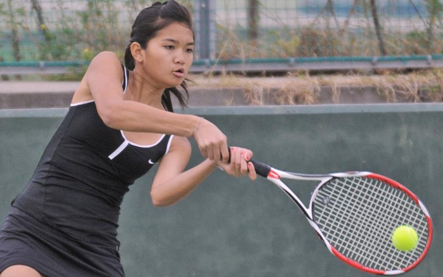 Zama American Trojans junior singles player Natalie Burke powers a backhand during Wednesday's Kanto Plain Association of Secondary Schools Tennis Tournament at Shirako, Chiba Prefecture, Japan. Burke finished second, losing in the final to Emily Beemsterboer of Yokota Panthers 6-2, 7-5.