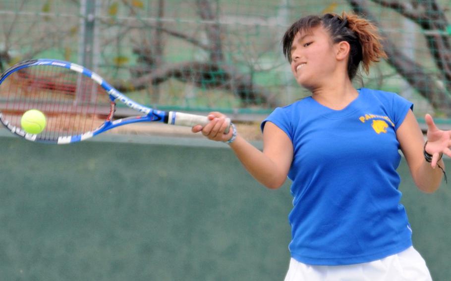 Yokota Panthers senior Anju Yamanaka smashes a forehand during Wednesday's Kanto Plain Association of Secondary Schools Tennis Tournament at Shirako, Chiba Prefecture, Japan. Yamanaka lost in the semifinals to eventual runner-up Natalie Burke of Zama American Trojans 7-6 (8-6), 6-4.