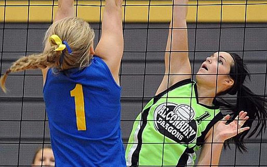 Alconbury's Marissa Cole goes up against Sigonella's Rachel Vosler in a Division III semifinal at the DODDS-Europe volleyball championships.  Sigonella won the match 25-20, 25-23, 22-25, 23-25, 15-13 and will face Rota in the title match.