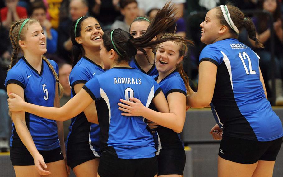 The Rota Admirals celebrate their third straight Division III title after defeating Sigonella 25-18, 25-23, 25-19 at the DODDS-Europe volleyball championships at Ramstein, Saturday.