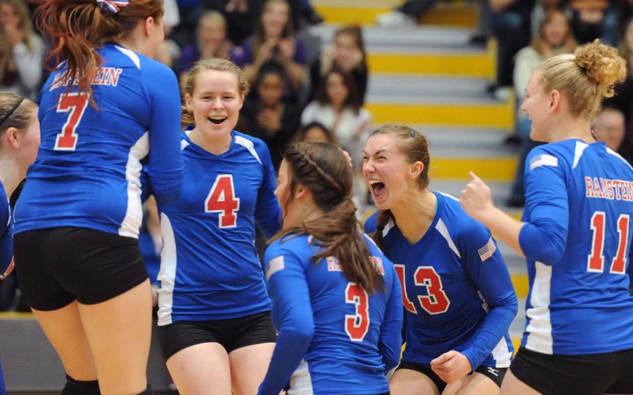 The Ramstein Royals celebrate their Division I title after defeating Patch 25-12, 25-14, 25-19 at the DODDS-Europe volleyball championships in Ramstein, Saturday.