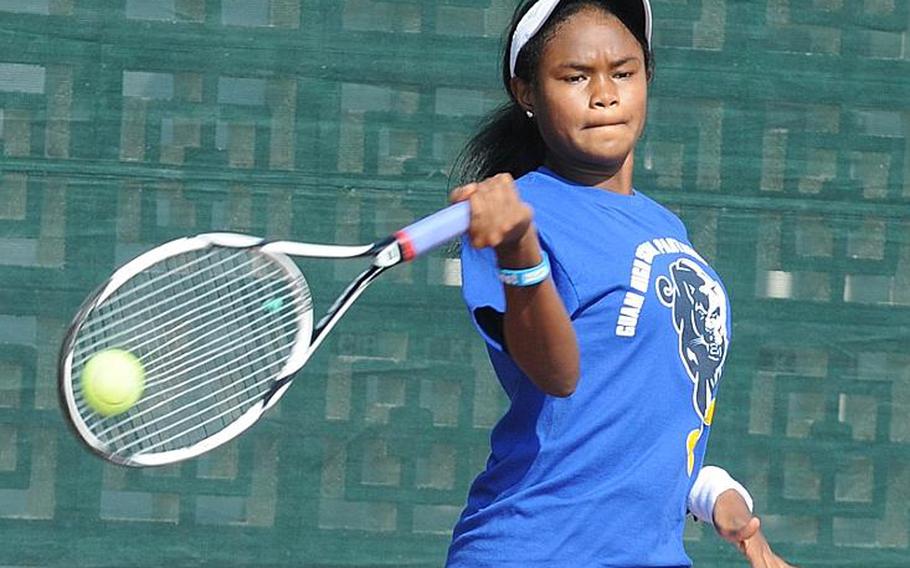Guam High's Chloe Gadsden delivers a forehand against Kadena's Erika Youngdahl during Thursday's girls singles championship in the Far East High School Tennis Tournament at Kadena Air Base, Okinawa. Gadsden repeated her singles title of a year ago, beating Youngdahl 6-0, 6-2.