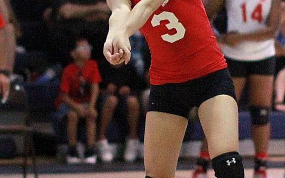 Nile C. Kinnick libero Kaile Johnson bumps the ball against American School In Japan during Saturday's championship match in the Far East High School Girls Division I Volleyball Tournament at Guam High School. ASIJ repeated its championship, beating Kinnick for the second straight year 25-17, 21-25, 25-20, 25-20.