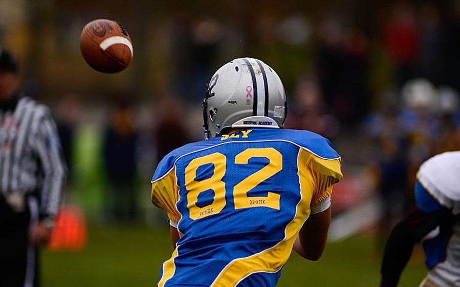 DODDS-Europe South All-Star football team member  Jack Sly of Bristol Academy catches a touchdown pass from teammate Jake Voorhees of Ansbach High School on Saturday afternoon in Vilseck, Germany as the South All-Stars defeated the North 29-10.