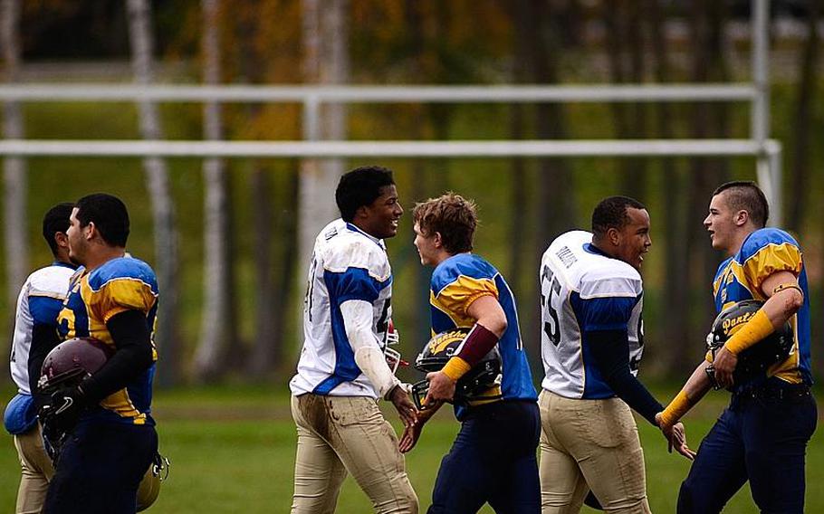 DODDS-Europe All-Star football team members  shake hands after the game Saturday afternoon in Vilseck, Germany as the South All-Stars defeated the North 29-10.