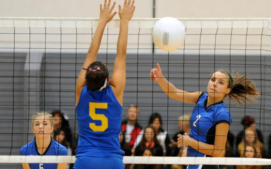 Rota's Aspen Luna watches her shot cross the net against Sigonella's Deeanna Brown in the Division III final at the 2012 DODDS-Europe volleyball championships on Nov. 3, as teammate Tiffani Driscoll watches. Luna has been named the Stars and Stripes volleyball Athlete of the Year for the second time.