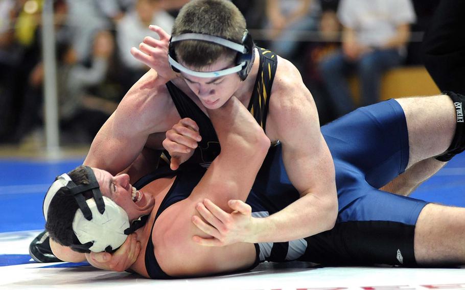 Patch's Robert Mannier, top, puts the pressure on Bitburg's Bryson Randall on his way to winning the 182-pound title at the DODDS-Europe wrestling championships in Wiesbaden last season. Mannier will be back for the Panthers when the 2012-13 DODDS-Europe wrestling season gets under way Saturday.