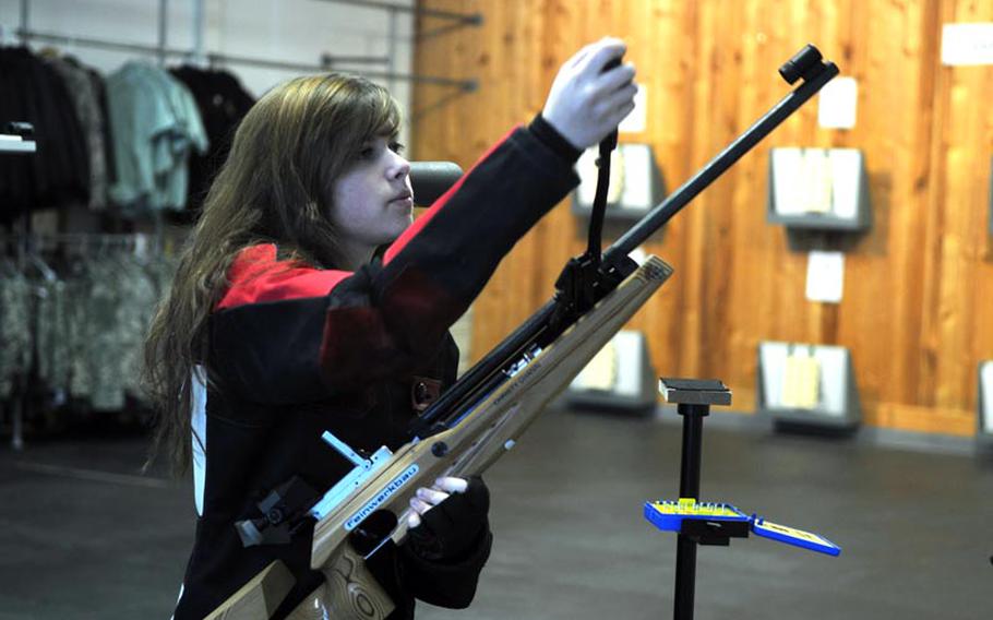 Vilseck senior Christy Chanin pumps her rifle before reloading during a marksmanship meet Saturday at Ansbach. Chanin was the top shooter with a score of 282.