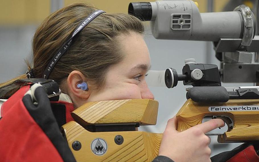 Patch's Maggie Ehmann sites in on her target during marksmanship practice Wednesday at Patch High School.