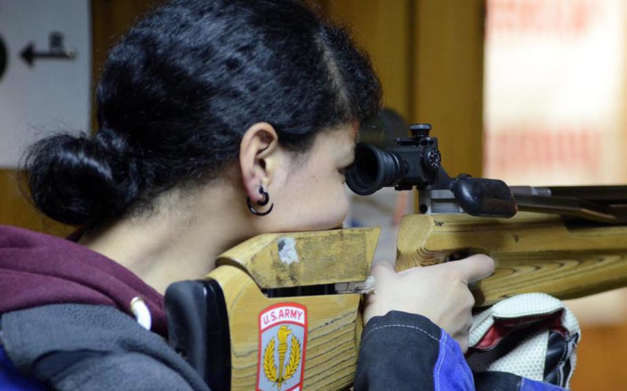 Wiesbaden freshman Alexis Beverly takes aim during a five-team marksmanship match in Heidelberg on Saturday. Beverly was the second highest scorer for Wiesbaden with her 196 points.