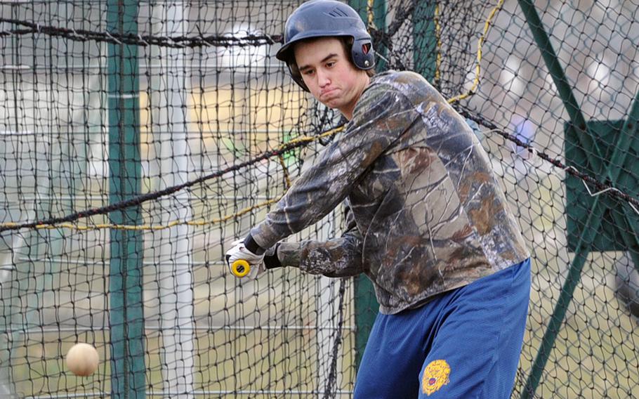 Heidelberg's Joseph Patrick gets ready to connect during batting practice as the Lions got ready for their final baseball season in March. The Lions have had an irregular season, like most of the DODDS-Europe baseball teams due to wet and cold weather. The team has yet to play a complete doubleheader on the day it was originally scheduled.
