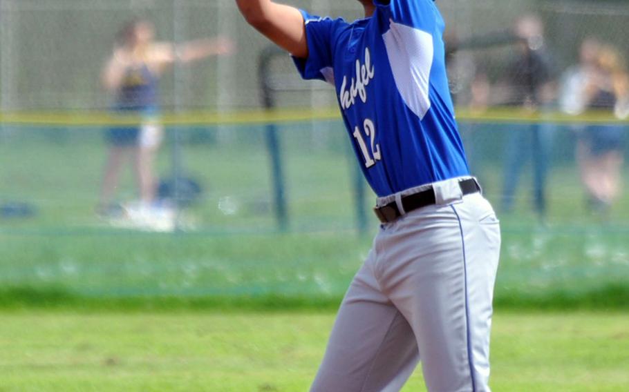 AJ Walker of Hohenfels pulls in a Lions fly ball in the first game of the final doubleheader in Heidelberg Saturday. The Lions swept the Tigers.