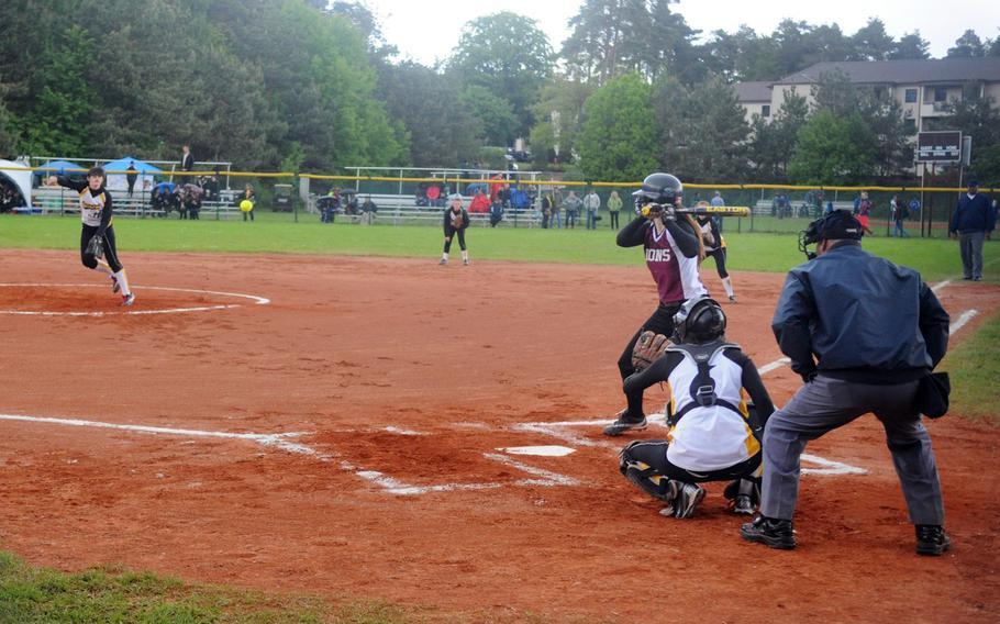 Vicenza sophomore Megan Buffington pitches Saturday to senior catcher Kate Panian and AFNORTH junior Morgan Beal during the 2013 Division II DODDS-Europe Softball Championship game against Vicenza on Ramstein Air Base. Vicenza won the game 6-4.