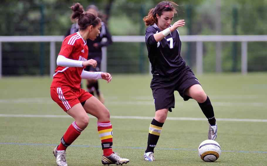 Patch's Caroline Rivera, right, controls the ball against Kaiserslautern's Ally Murphy in a Division I semifinal at the DODDS-Europe soccer championships, May 22, 2013. Rivera has been selected the Stars and Stripes girls soccer athlete of the year.