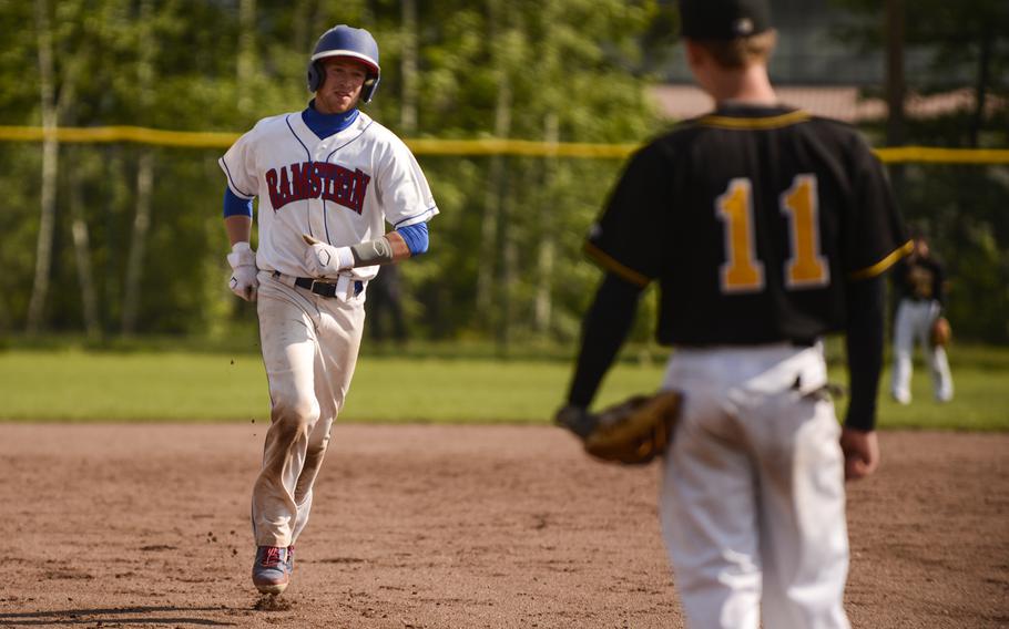 Ramstein's Justin Pendergrass trots around the bases after hitting a two-run home run in the 2013 DODDS-Europe Division I baseball championship game at Ramstein Air Base, Germany May 25, 2013.
