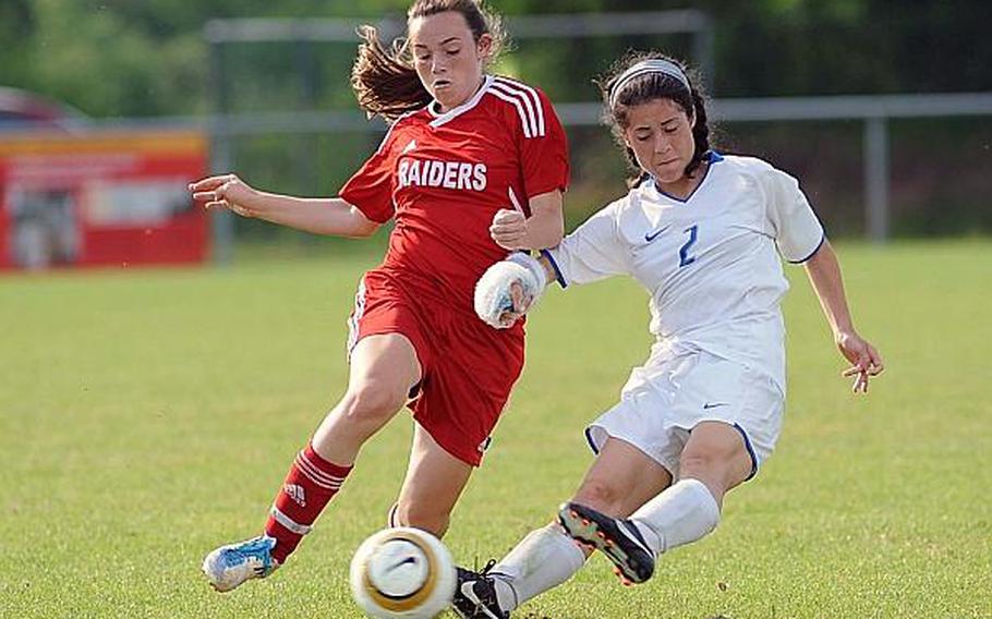Ramstein's Josie Seebeck attempts to center the ball against Kaiserslautern's Arianna Osmar in a Division I semifinal at the DODDS-Europe soccer championships in 2012. Seebeck, a former Stars and Stripes soccer Athlete of the Year and DODDS All-Europe selection was killed in a car accident near Charlotte, Mich., according to Central Michigan University, where she was going into her second season.