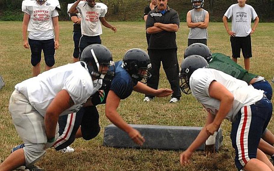 Bitburg coach Mike Laue watches lineman battle each other during an August practice session. The Barons have won 30 straight DODDS-Europe football games and look to tie Ansbach's all-time record with a victory on Saturday. And until it's beaten, Bitburg again looks like the class of Division II.