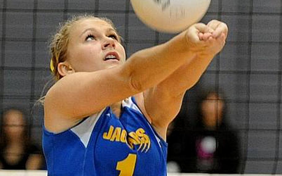 Sigonella's Rachel Vosler returns a ball in last year's Division III finals in Ramstein Vosler will be returning for the Jaguars this season.