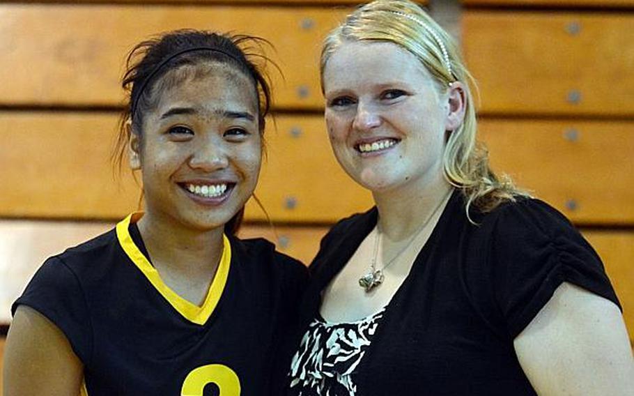 Former Kadena senior middle blocker Nia Rodriguez, with her coach Kelli Wilson prior to Rodriguez's last match in Kadena uniform on Thursday. The Panthers lost to Kubasaki in straight sets. Rodriguez transferred two days later to Cannon Air Force Base, N.M., and will now play for Clovis High School's Wildcats.