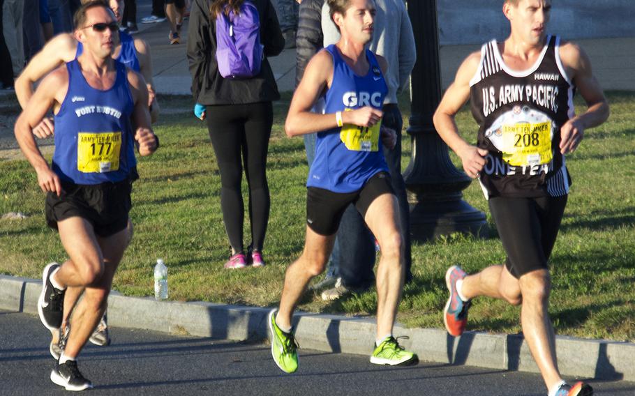 In an October, 2013 file photo, Stephen Marthy of Honolulu and U.S. Army Pacific leads a group of runners past the two-mile mark of the Army 10-Miler in Arlington, Va. and Washington, D.C. Marthy finished 49th overall.