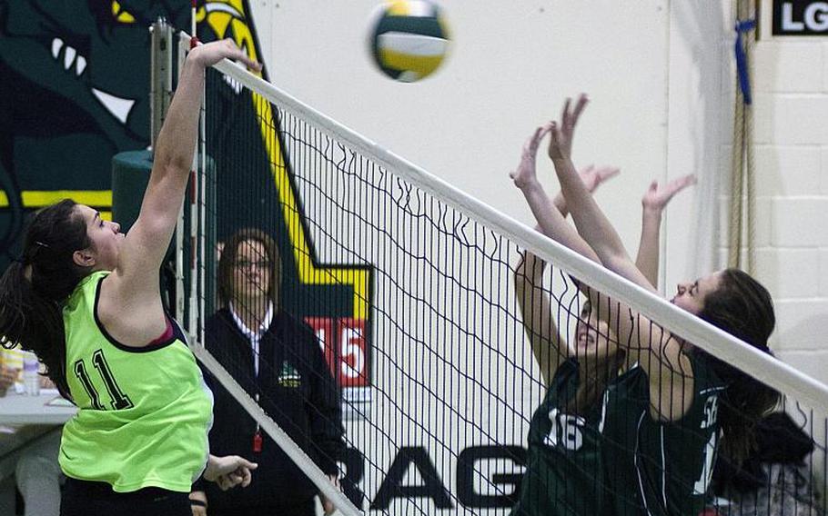 Leila Hall, Alconbury junior, hits the ball against SHAPE during a game at RAF Alconbury, England, Saturday, Oct. 5, 2013.The DODDS-Europe volleyball championships get under way at Ramstein and Kaiserslautern on Thursday, Oct. 31.