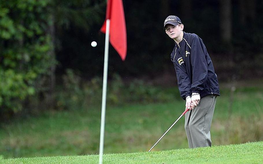 Patch freshman Jordan Holifield chips to the green on the final day of the DODDS-Europe golf championships, Thursday, Oct. 10, 2013. Holifield took the title, shooting a Stablefield 98 for two rounds and has been named the Stars and Stripes boys golf Athlete of the Year.
