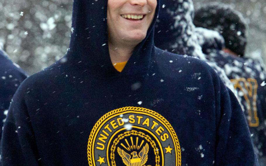 Navy Lt. Brian Allen manages a victory smile after Friday's Army-Navy flag-football rivalry game at  Misawa Air Base, Japan. Naval Air Facility Misawa beat the Army's 708th Military Intelligence Detachment 27-0 in a game played in wind-blown snow with temperatures around freezing.