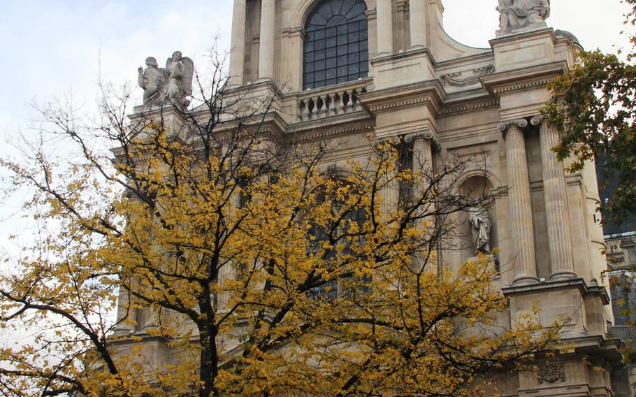 An elm tree well-known among the French stands before the towering St. Gervais-et-St.-Protais Church in the Marais district of Paris. The French saying "Attendez-moi sous l'orme" (Wait for me under the elm) refers to this tree, Paris Greeter Claudine Chevrel said.