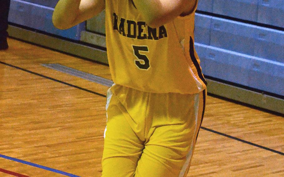Kadena junior Alicia Vaughan, shown playing Jan. 16, 2014, in the 20th Martin Luther King Invitational Basketball Tournament at Marine Corps Air Station Futenma, Okinawa, is the second member of her family to don Panthers black and gold. 
