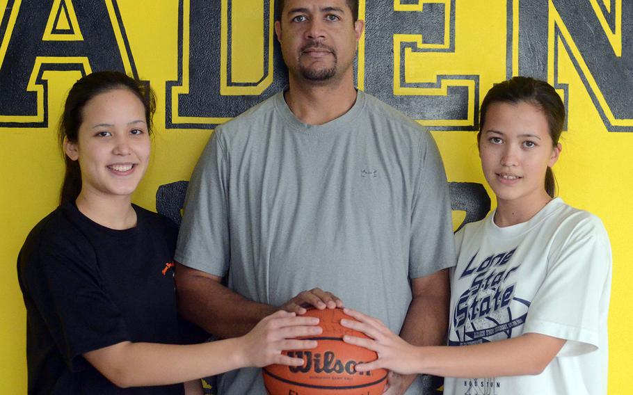 Kadena junior shooting guard Alicia Vaughan, coach Willie Ware and freshman point guard Linda Vaughan.