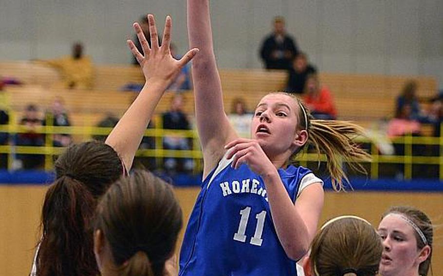 Shelby Atkinson of Hohenfels gets off a jumper in the Tigers' 37-33 win  over Heidelberg last season, Jan. 11, 2013 at Heidelberg, Germany.