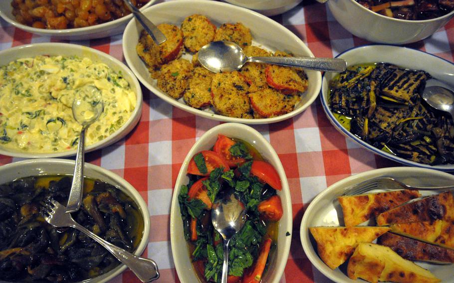 With grilled vegetables, cured meats and olives, the antipasto, or appetizer, buffet at Trattoria Da Rinaldo in Catania, Sicily, offers a variety of items at a good price.