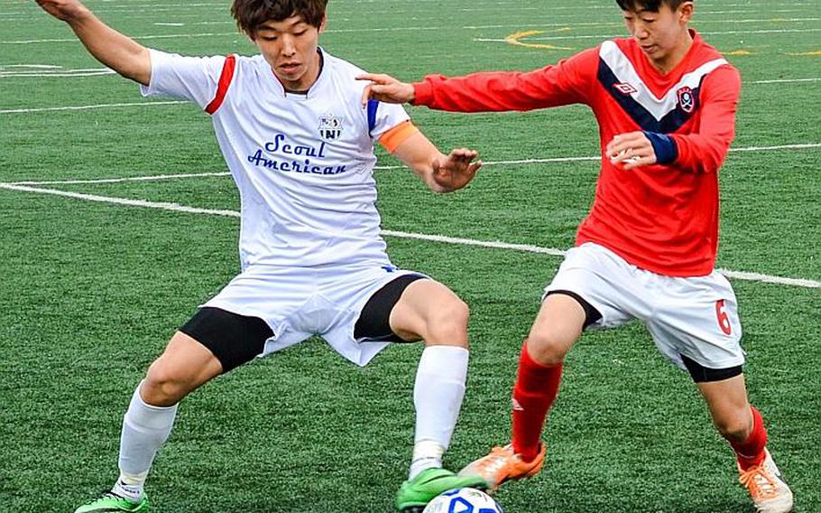 Seoul American senior midfielder HoKyung Adams, left, shown playing against John Gong of Yongsan International-Seoul, is one of five veterans populating what Falcons coach Steve Boyd calls a "powerful" midfield, including Jason Lee, Ben Mitchell, Andrew Clark and Allen Choi.