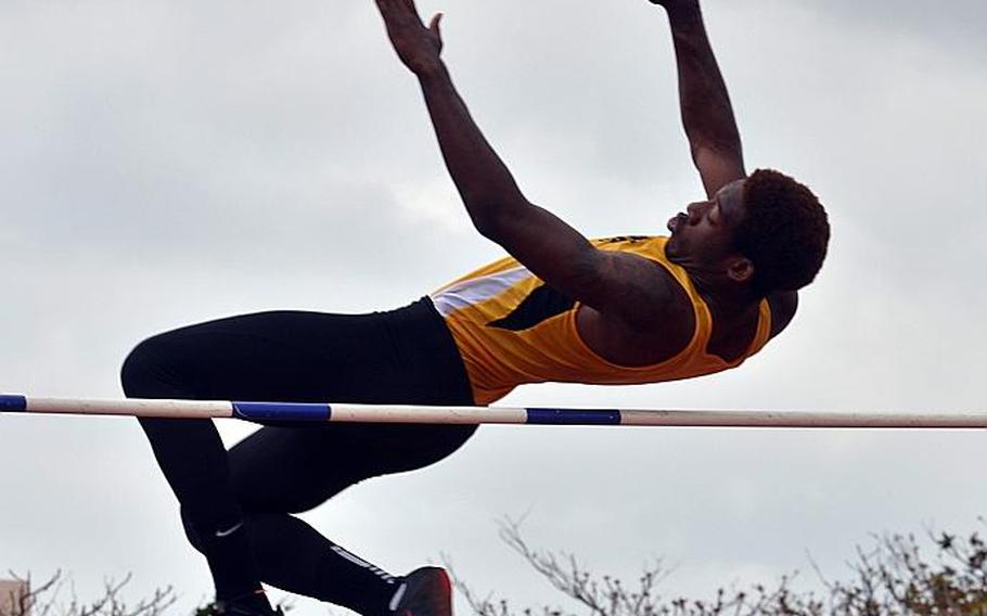 Kadena's Preston Harris clears the high jump bar during an Okinawa track and field meet at Mihama, Okinawa in April. Harris, who has qualified for the Far East Track and Field Meet, won with a jump of 6 feet, 2 inches.