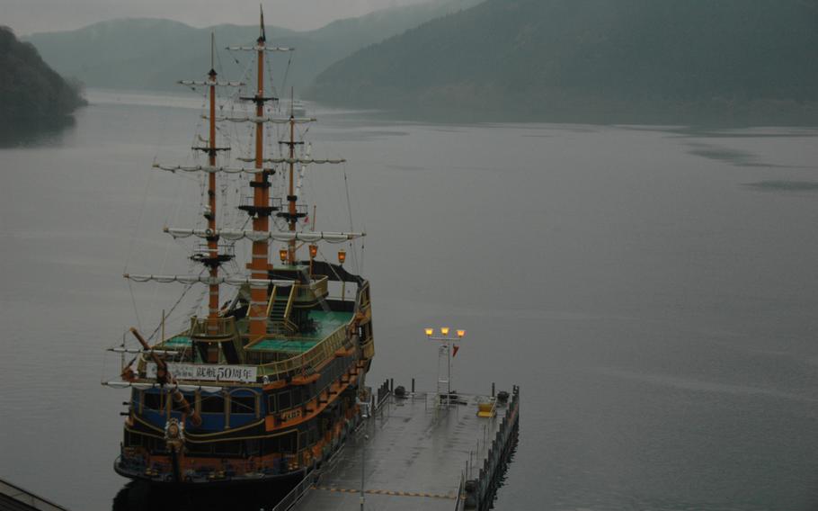 A "pirate ship" waits to sail visitors across Lake Ashi at Hakone, Japan. The ships are just decorated transports, but you can have your picture taken with a person dressed as a pirate on your journey.