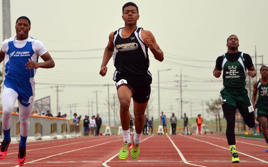 Humphreys' Daiquan Wilson, shown running in a DODDS Korea meet against Seoul American's Myles Haynes and Daegu's Anfernee Dent and Blake Smaw, is one of the sprint favorites in next week's Far East Track and Field Meet at Yokota.