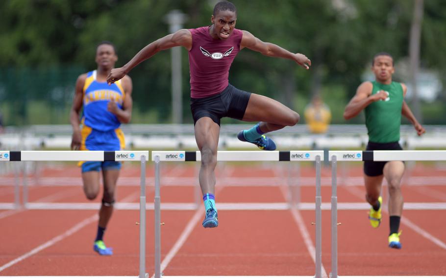 Vilseck's David Harris crosses the last hurdle to win the 300-meter hurdles at the DODDS-Europe track and field championships in Kaiserslautern, Germany, Saturday, May 24, 2014. Harris, who also won the 110-meter race, has been selected as the Stars and Stripes Athlete of the Year for boys track and field.