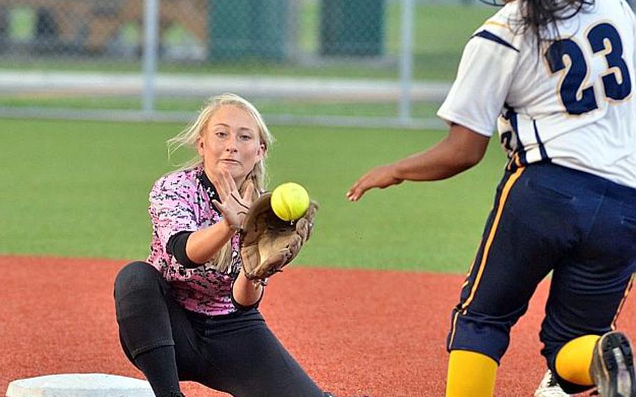 Kadena freshman shortstop Macalah Danielsen, readying the tag on Guam's Savannah Solang in the Far East Division I Softball Tournament final, batted .667 to lead the Panthers and had a .913 fielding percentage on 46 changes during the season.